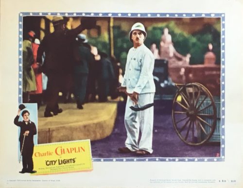 Original vintage cinema Lobby Card for the 1050 release of the classic comedy from Charlie Chaplin, City Lights, measuring 11 ins by 14 ins