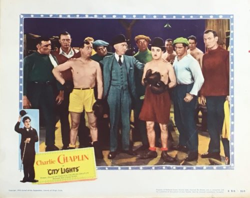 Original vintage cinema Lobby Card for the 1050 release of the classic comedy from Charlie Chaplin, City Lights, measuring 11 ins by 14 ins