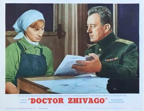 Original US Lobby Card for Dr Zhivago showing Alec Guinness trrying to find out who Rita Tushingham's parents are.