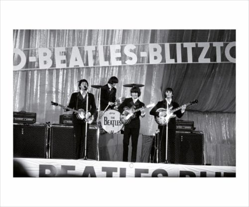 Limited edition black and white photo of The Beatles measuring 16 ins by 22 ins