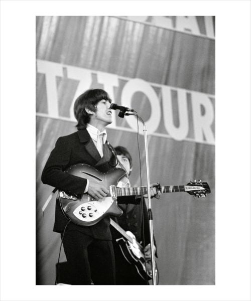 Exclusive limited edition photographic print of George Harrison on stage with the Beatles