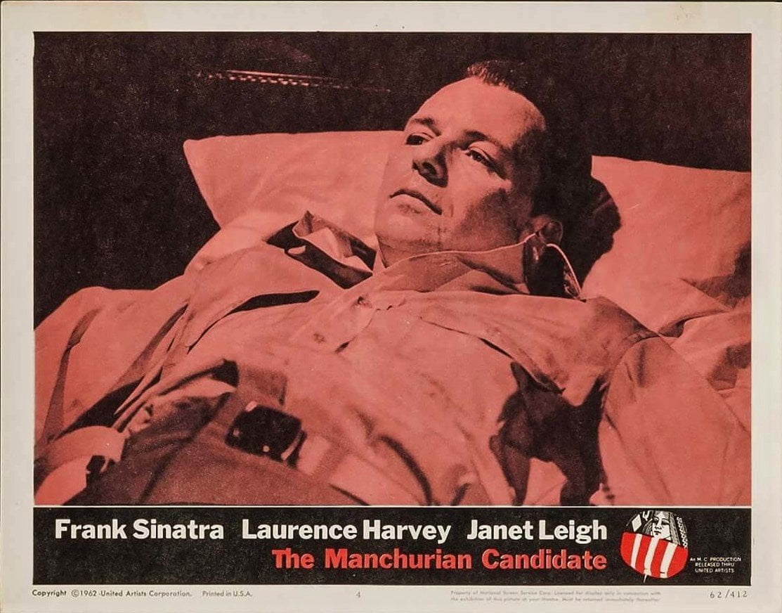 Original vintage US cinema lobby card poster for neo-noir thriller The Manchurian Candidate